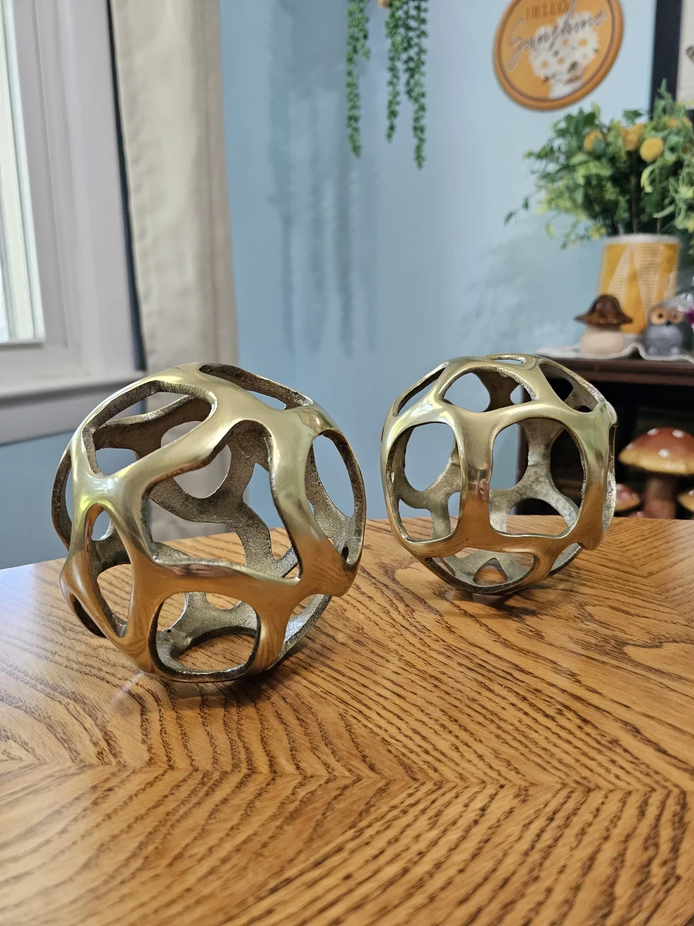 Pair of Vintage Solid Brass Cutout Geometric Spheres Abstract Orbs Sculpture